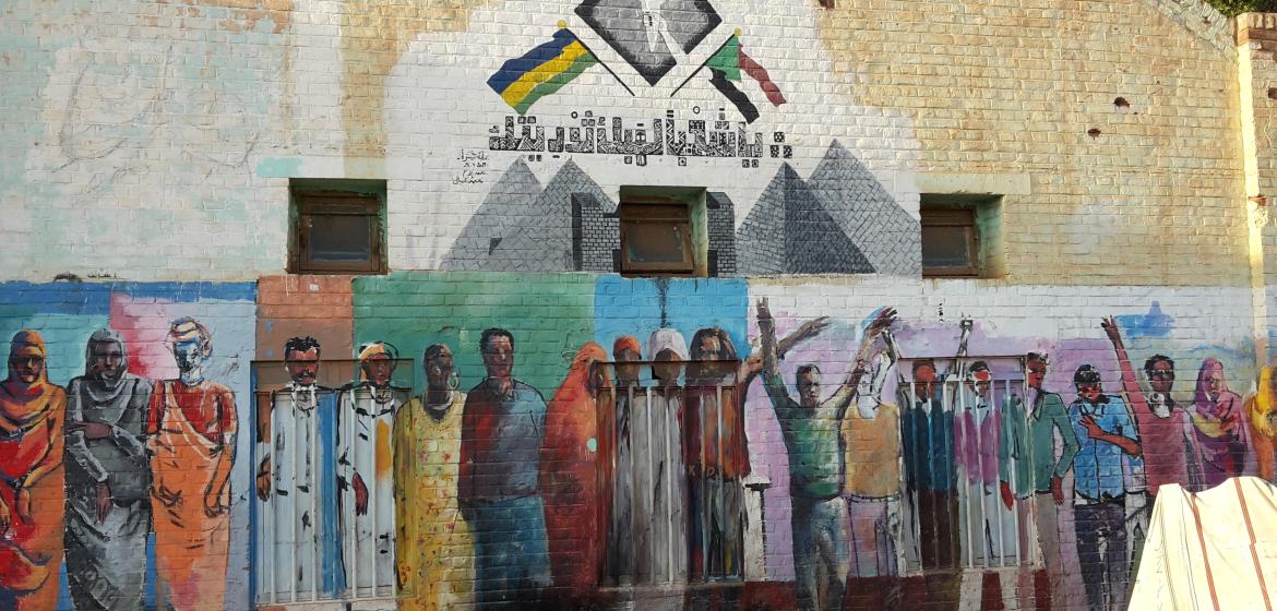 Eine Zeichnung aus der Revolution 2019, die die verschiedenen Bevölkerungsgruppen aus dem Sudan abbilden soll. Foto: Alex Waiblinger 2020/21