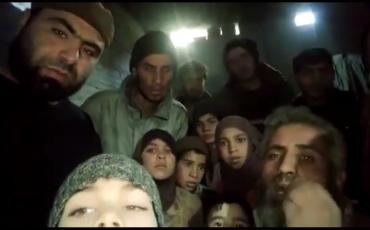 Amer (links) und Bekannte in einem Bunker unter Ghouta. Foto: Video-Screenshot.